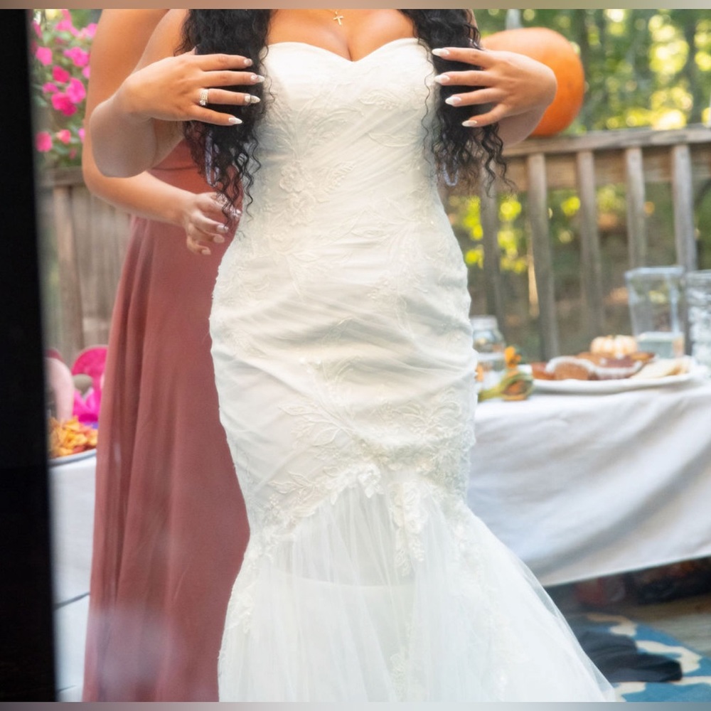 Mermaid style corset push up bra wedding dress with long veil. Worn once.